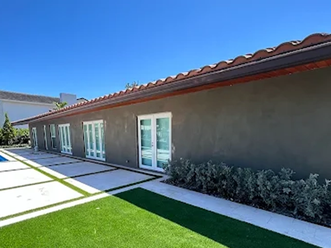 Stucco repair and exterior wall finish on a residential property in Boca Raton